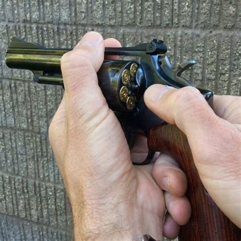 Image result for Unloading a Single Action Revolver