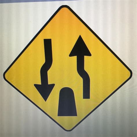 You are driving on a divided highway and you see this traffic sign ...