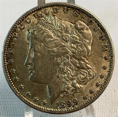Lot - 1899-O US $1 Morgan Silver Dollar