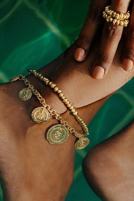 Buy Gold Plated Beads Molten Metal Anklet by Arvino Online at Aza Fashions.