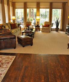 Wood Or Carpet In Living Room by Patterned Carpet And Scraped Wood Floor Traditional Wood Or Carpet In Living Room