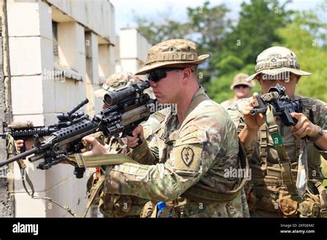 Spc. Robert Britt, left, and Pfc. Trevor Surico-Pink, assigned to B ...