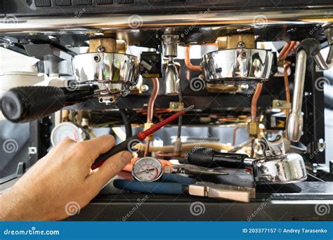 Repair of the Coffee Machine Photo. Stock Image - Image of master ...