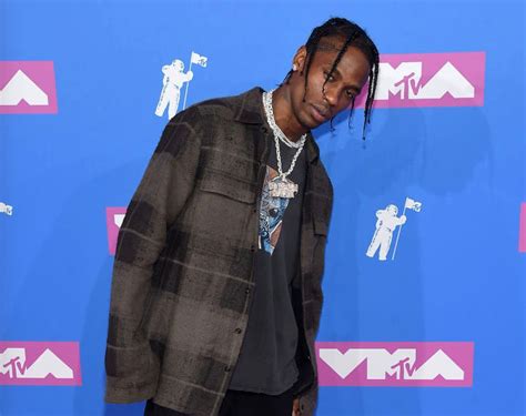 Travis Scott Flexes His "Priceless" Rolling Loud Fit