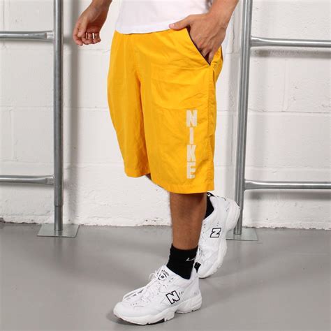 Nike Men's Yellow Shorts | Depop