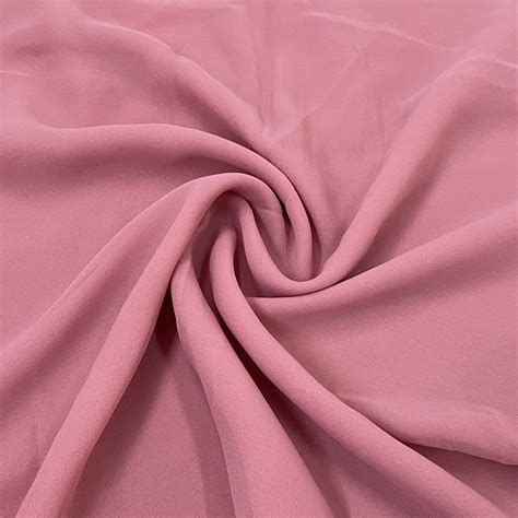 Buy Classic Peach Pink Solid Georgette Fabric Online – TradeUNO Fabrics