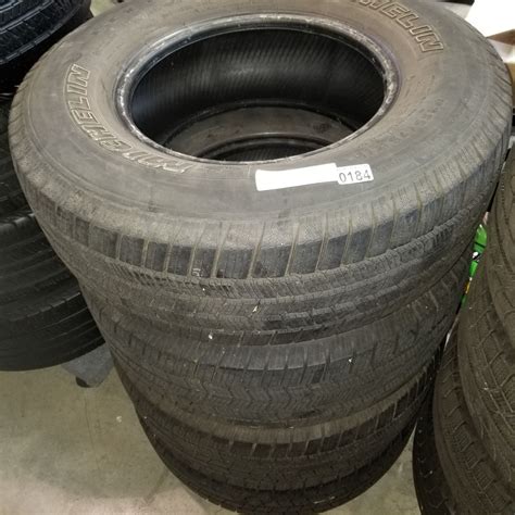 SET OF 4 MICHELIN 235/75 R15 TIRES