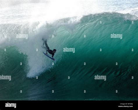 Surfing big waves at The Wedge Stock Photo - Alamy