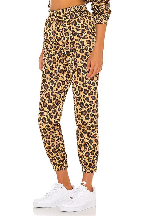 Adam Selman Sport Unisex Workwear Track Pant in Honey Leopard | REVOLVE
