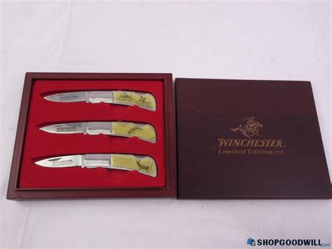 Winchester Limited Edition 2006 3-piece Pocket Knife Set in Cherry-Colored Case - shopgoodwill.com