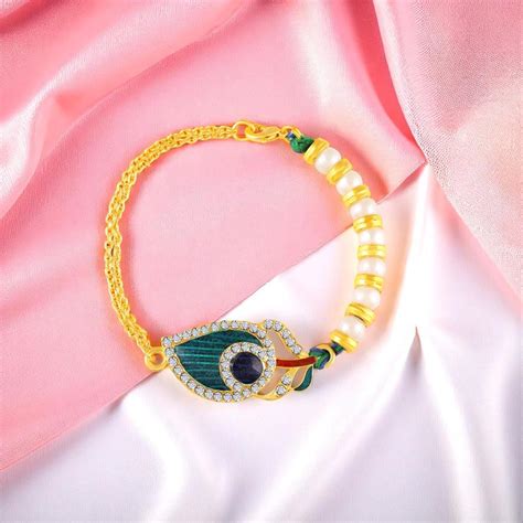 Mahi Peacock-Feather-Shaped Lumba Rakhi for Bhabhi | Artificial Pearl ...