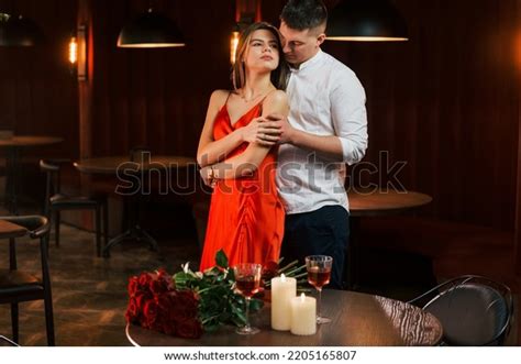 Two People Standing Together 的图像结果