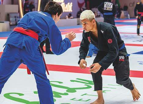 Brazilian teenager sells candies, peanuts to chase jiu-jitsu dream ...