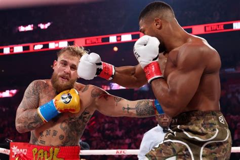 MIAMI, FLORIDA - DECEMBER 19: Anthony Joshua speaks at a press conference after Jake Paul v Anthony Joshua at Kaseya Center on December 19, 2025 in Miami, Florida. (Photo by Carmen Mandato/Getty Images for Netflix)