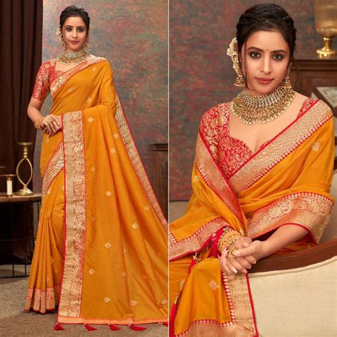 Mustard Yellow Woven Pure Silk Saree With Tassels