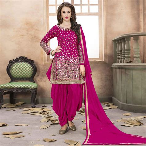 Amazing Magenta Pink Colored Partywear Embroidered Tapeta Silk Patiala Suit