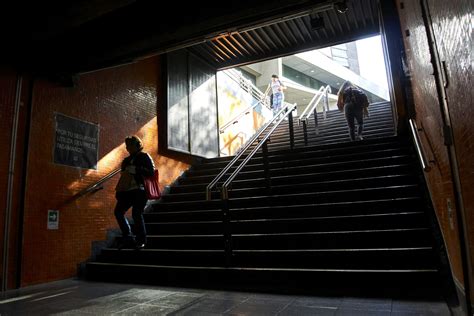 People Walking Up Stairs 的图像结果