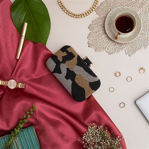 THE TAN CLAN Patcher Hand Embroidered Clutch – AGASHE