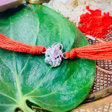 Pure 92.5 Sterling Silver Ganpati Rakhi with Chandan Tilak Set – Unniyarcha
