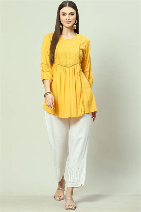 Yellow LIVA Flared Solid Kurti at Biba India