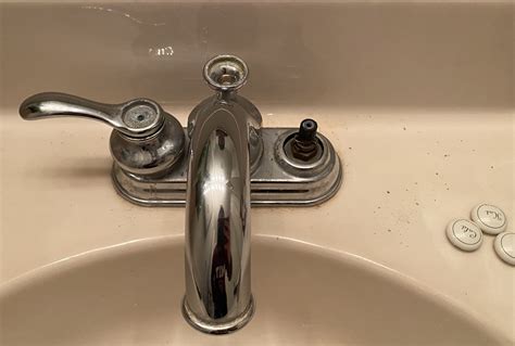 How to disassemble this old faucet? faucet supply line is leaking which needs to be replaced ...