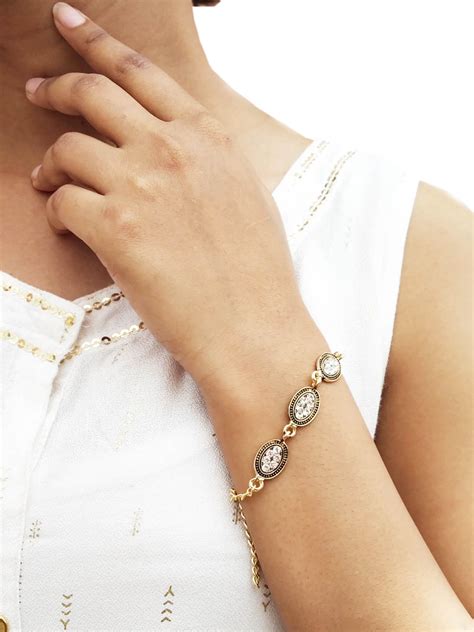 Gold Toned Stone embedded Charm Bracelet – Manmarzi