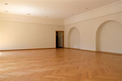 A Big Empty Room with Wooden Flooring · Free Stock Photo