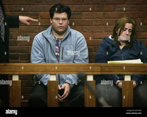 Michael Riley, 34, and his wife, Carolyn Riley, 32, are shown in ...