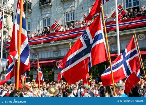 Children Marching and Waving Norwegian Flags Whilst Watched from ...