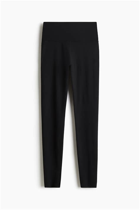 Yoga leggings with SoftMove™ Lycra® - Black - Ladies | H&M IN