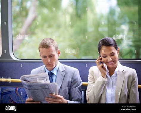 Coworkers on their commute. young business people commuting to work Stock Photo - Alamy