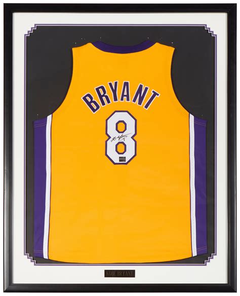 Lot - An autographed Kobe Bryant Los Angeles Lakers framed jersey