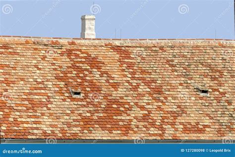 Roof with clay shingles stock photo. Image of roofing - 127280098