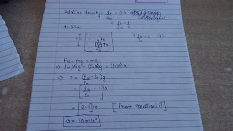 A small block of wood of relative density 0.5 is submerged in water ...