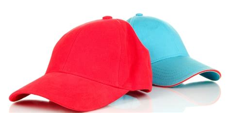 Red and blue caps cap on white | Premium Photo