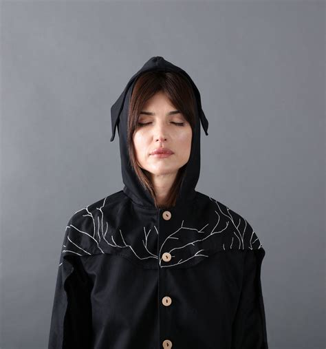 Go Green All the Way to the Grave in This "Mushroom Death Suit" - Dwell