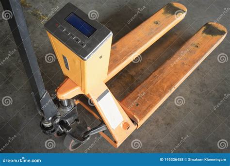 Yellow Hand Pallet Truck or Manual Hand Lift with Digital Weigh Scales Stock Photo - Image of ... - Floor Scale Lifts