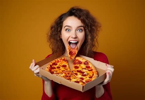 Photo portrait of young hungry girl friends eating pizza together ...