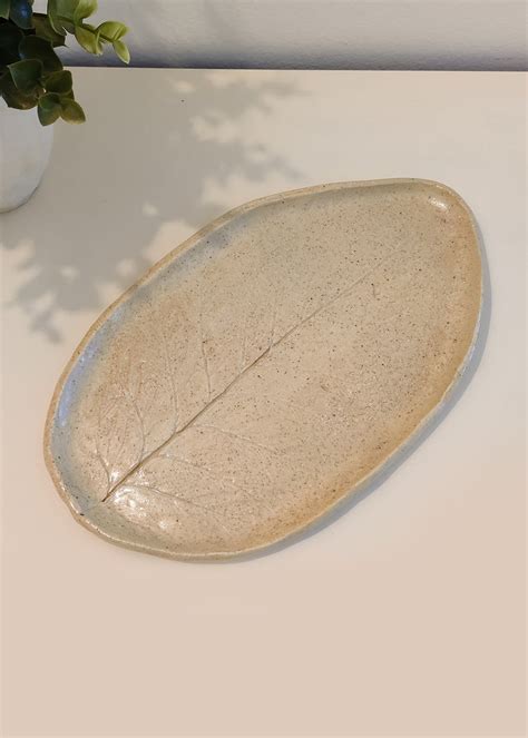 Get Leaf Platter - Beige at ₹ 1800 | LBB Shop