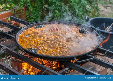 Typical Spanish Paella Cooked on Natural Log Fire and Coal in a ...