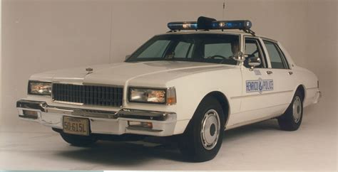 This early 1990s Chevrolet police vehicle has a light bar. | Police ...
