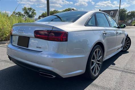 Who Makes Audi? (The History and Company Behind the Badge)