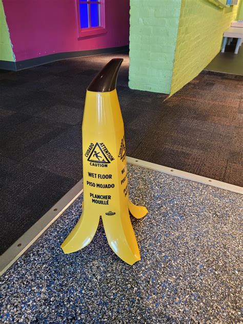 Banana peel shaped wet floor signs at my local science center : r ...