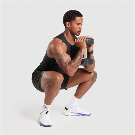 Squats With Dumbbells