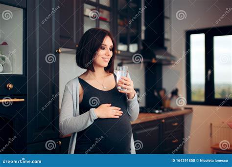 Pregnant Woman Drinking a Glass of Water for Healthy Pregnancy Stock ...
