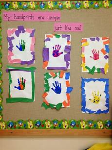 5 hand print activities to do with your unique handprints tear construction paper to create frame 5 hand print activities to do with your unique handprints tear construction paper to create frame