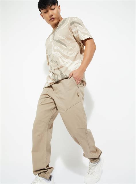 Buy URB_N Men Solid Relaxed Fit Joggers Online at just Rs. 1299.0 ...