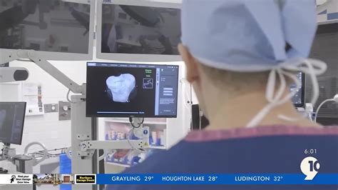 A new robotic tool is helping surgeons at Munson Traverse City perform ...