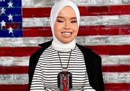 Image result for Putri Ariani receives the Golden Buzzer on AGT