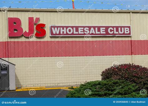 A Red Sign for BJ`s Wholesale Club As Seen on the Side of it`s Building Editorial Image - Image ...